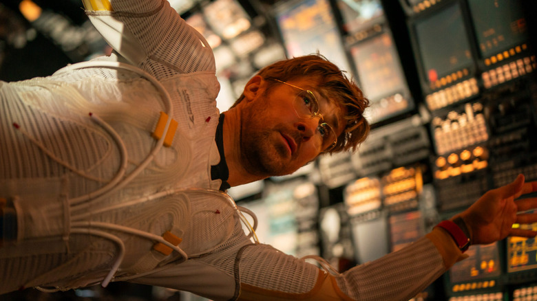 Ryan Gosling as Ryland Grace floating through zero-g inside a spaceship in Project Hail Mary