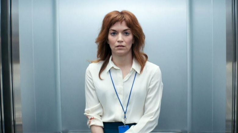 Helly R. in the elevator on Severance.