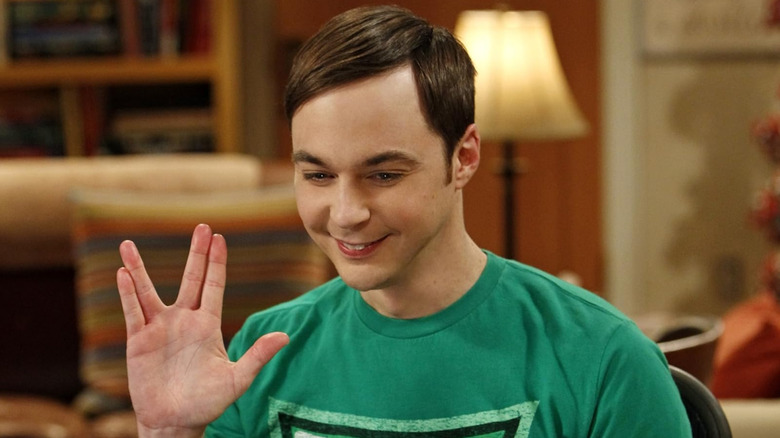 Jim Parsons as Sheldon Cooper doing the Vulcan hand gesture in The Big Bang Theory