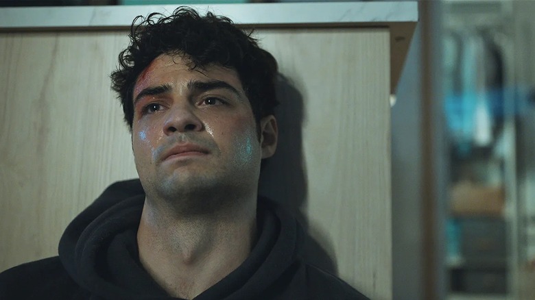 Noah Centineo is sweating it as Owen Hendricks in The Recruit