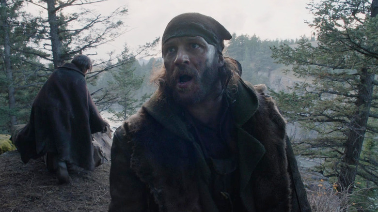 Tom Hardy as John S. Fitzgerald looking worried in The Revenant
