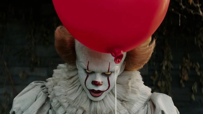 Pennywise with a red balloon