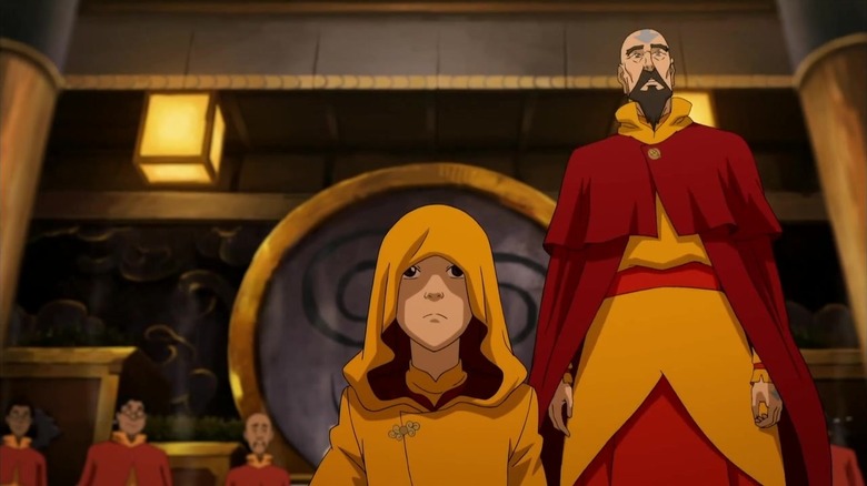The Legend of Korra - Jinora with a hood, kneeling, and Tenzin
