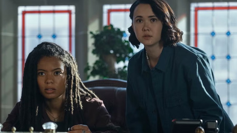 Marie and Jordan look anxious while snooping in a principal's office in Gen V