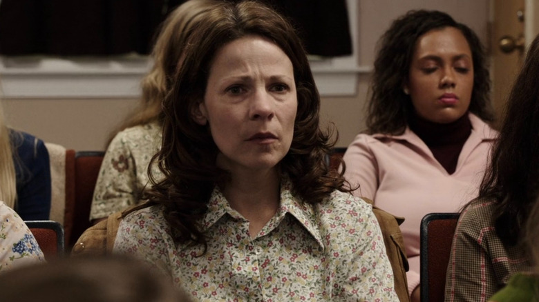 Caroline Perron listening to the Warrens in The Conjuring