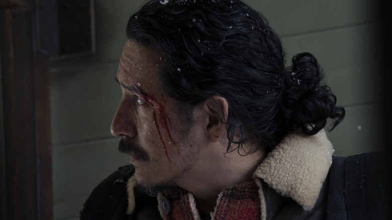 Tommy with a cut forehead in The Last of Us