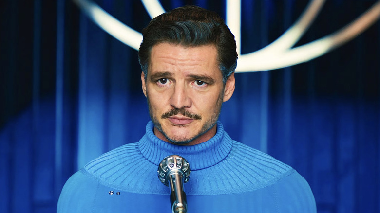 Reed Richards speaking into a microphone in Fantastic Four: First Steps