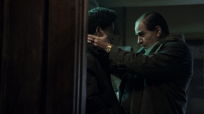 Oz comforting Victor in The Penguin