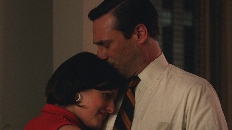 Elisabeth Moss and Jon Hamm dancing in Mad Men