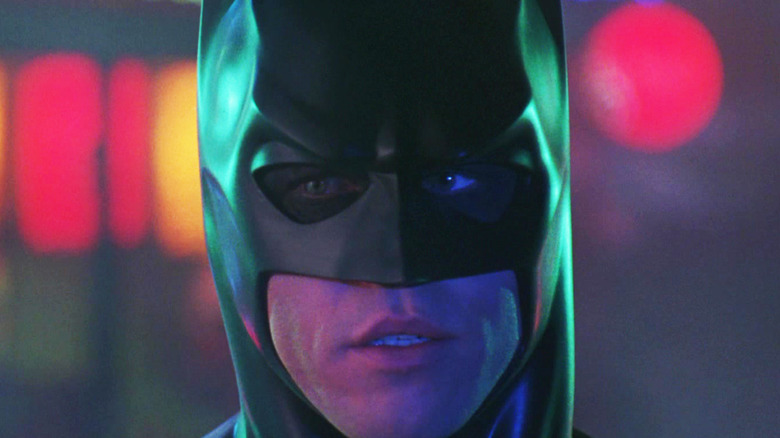 Val Kilmer's Batman looks off to the side in Batman Forever