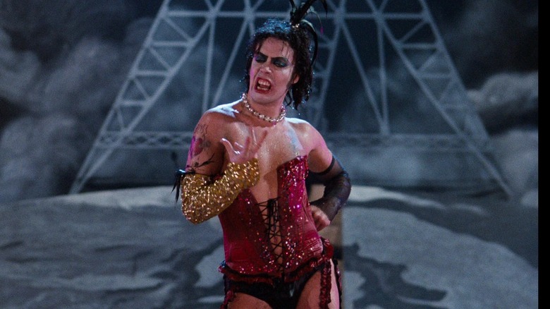Dr. Frank-N-Furter dripping wet in a corset in The Rocky Horror Picture Show