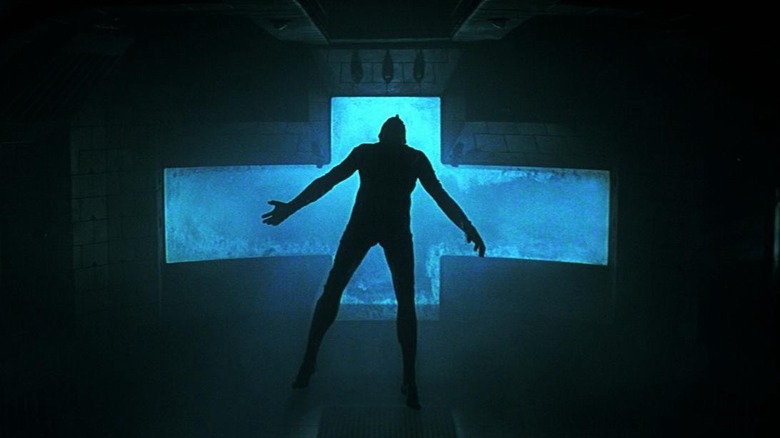 Astronaut floating in chamber Event Horizon