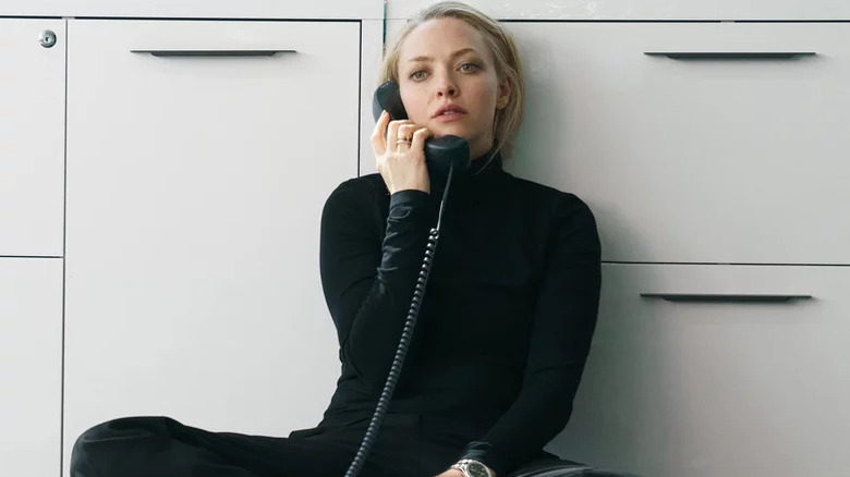 Elizabeth Holmes taking a phone call in The Dropout
