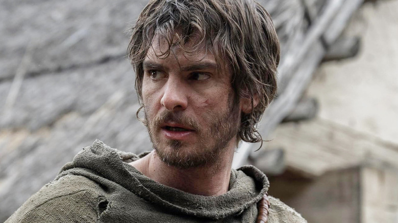 Andrew Garfield's Ploughman looking to his right in The Uprising