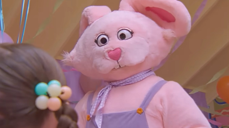 Betty Bunny looking at a child in Buddy