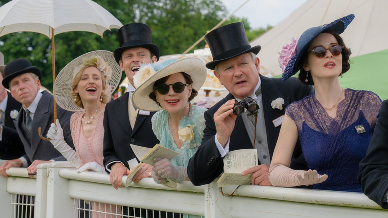 The Crawley family watching an event in Downton Abbey: The Grand Finale