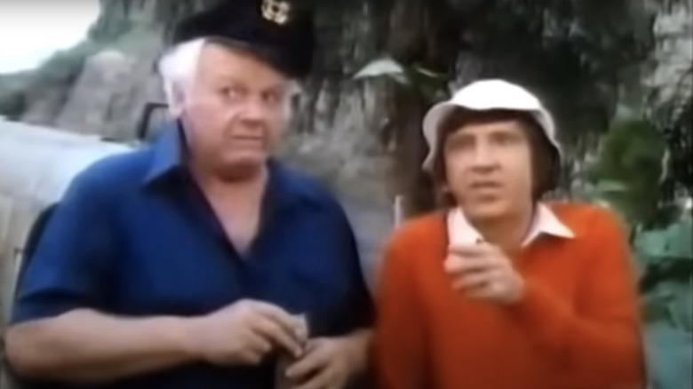 Alan Hale Jr. as The Skipper stands alongside Bob Denver as Gilligan in The Castaways on Gilligan's Island
