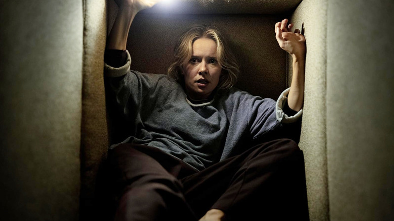 Amelia Eve as Gemma Hall trapped in an endless pillow fort in Insidious: Out of the Further