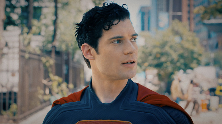 David Corenswet as Superman in the streets of Metropolis