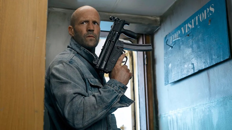 Jason Statham wields a machine gun as Cole Reed in Mutiny
