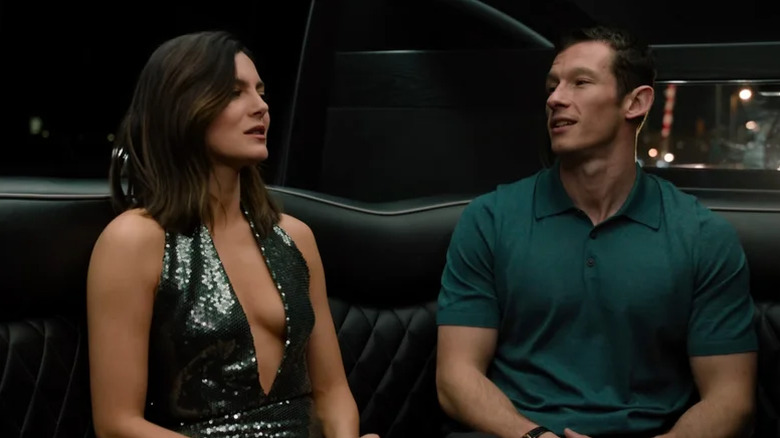 Allie and Owen sitting in a car talking in One Night Only
