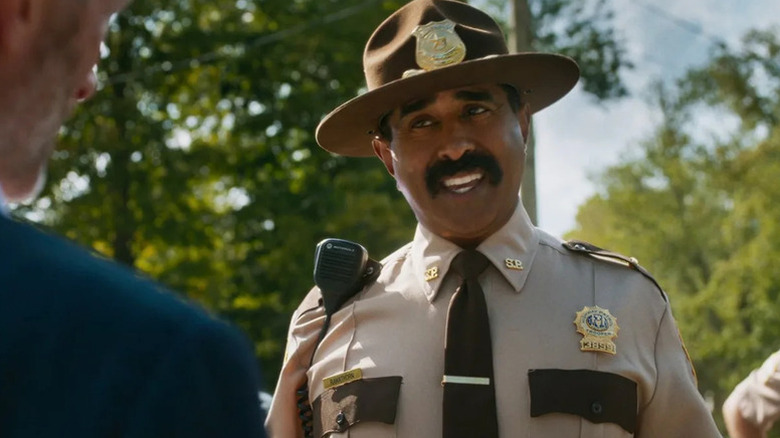Jay Chandrasekhar pulls over a motorist as Arcot "Thorny" Ramathorn in Super Troopers 3