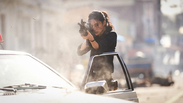Sung-ae fires a gun in Hope