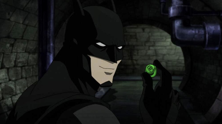 Justice League War - Batman in sewer holding Green Lantern's rung