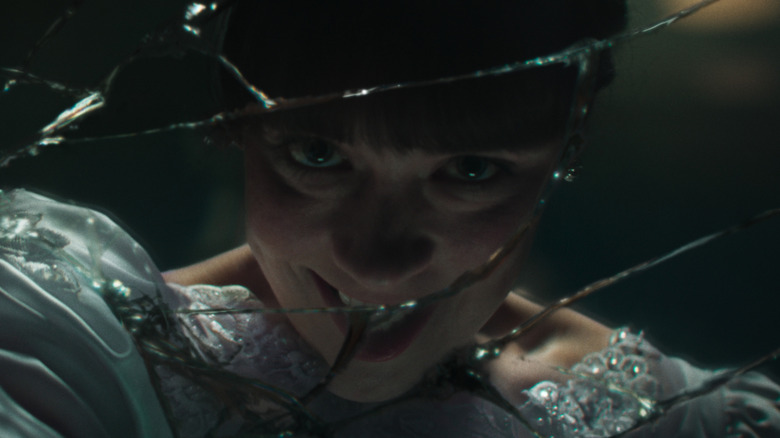 Judy's evil reflection grinning in The Conjuring: Last Rites