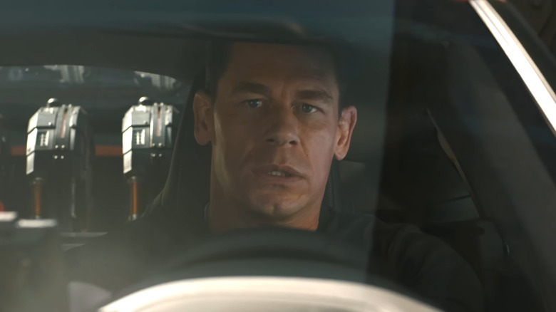 John Cena as Jacob driving a car in F 9