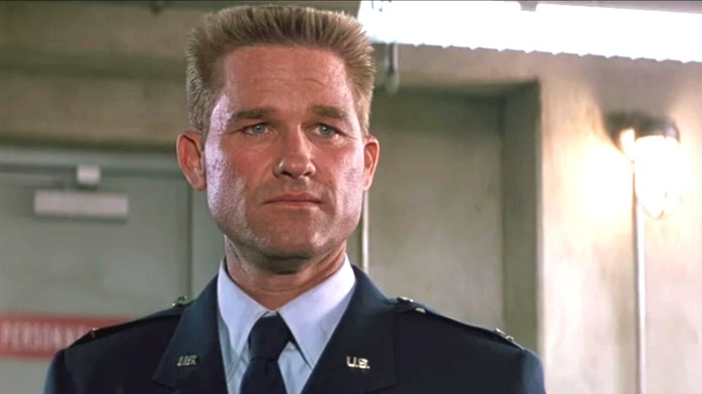 Kurt Russell as Jack O'Neil with a stern expression in Stargate