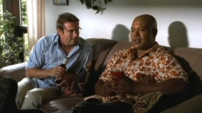 Michael Shanks and Christopher Judge sitting side by side on a couch on From Stargate to Atlantis: A Sci-Fi Lowdown