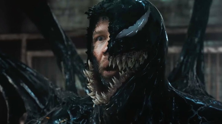 Venom opens his face to reveal Tom Hardy's Eddie in Venom: The Last Dance