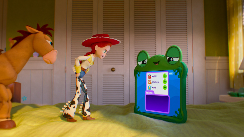Joan Cusack as the voice of Jessie standing on a bed with her hand on hips opposite Greta Lee as Lilypad in Toy Story 5