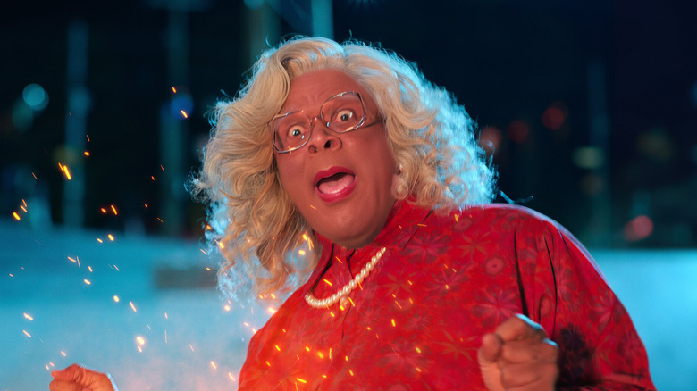 Madea Simmons (Tyler Perry) reacts with surprise by a fire in Madea's Destination Wedding