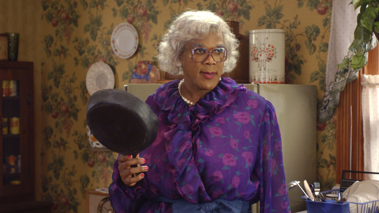 Madea Simmons (Tyler Perry) holds a frying pan in Madea's Family Reunion