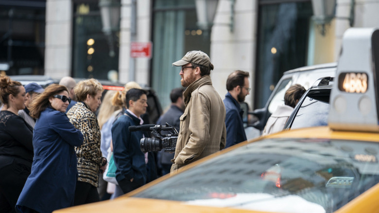 John Wilson on a crowded NYC street