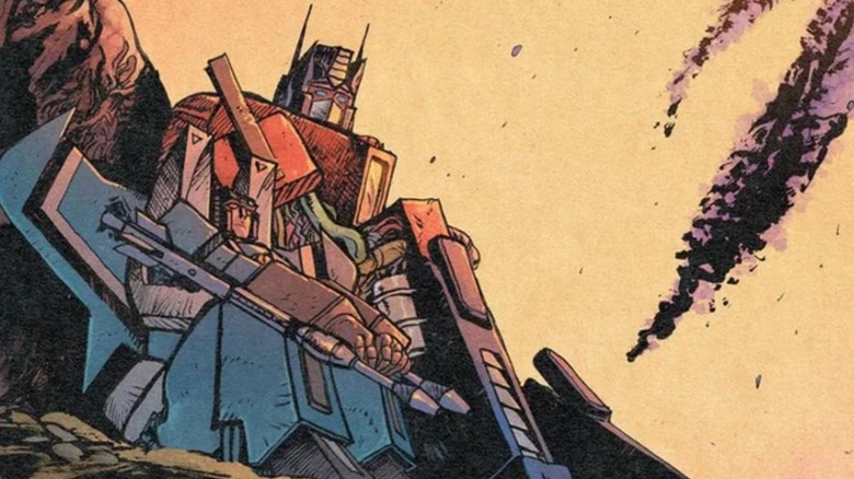 Thundercracker and Optimus Prime sitting together under a big tree in the Transformers #27 cover by Jorge Corona