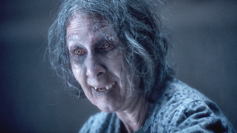 Maude Davey looks rough and toothless as Polly in Evil Dead Burn