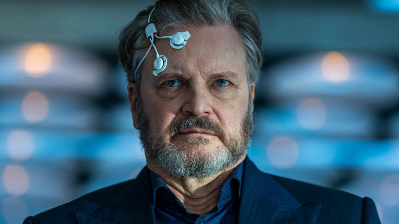 Colin Firth as Noah Scanlon wearing brain monitoring equipment in Disclosure Day