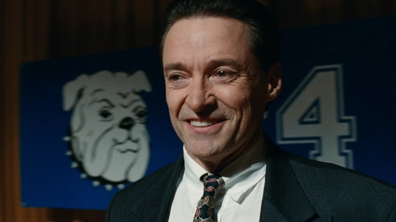 Hugh Jackman as Dr. Frank Tassone smiling in Bad Education