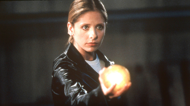 Buffy holding an orb in Buffy the Vampire Slayer