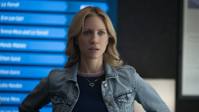 Mandy looking shocked wearing a jean jacket in front of a screen in Murdaugh: Death in the Family