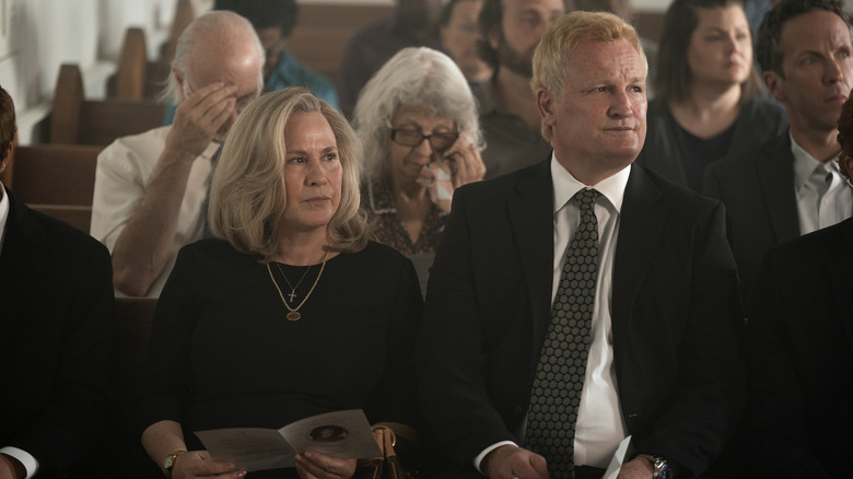 Maggie and Alex in church looking somber in Murdaugh: Death in the Family