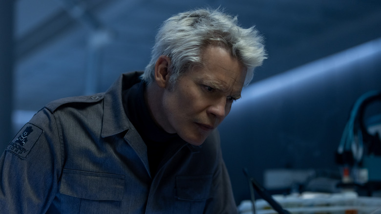 Kirsh looking intently at samples in the research lab at Neverland in Alien: Earth
