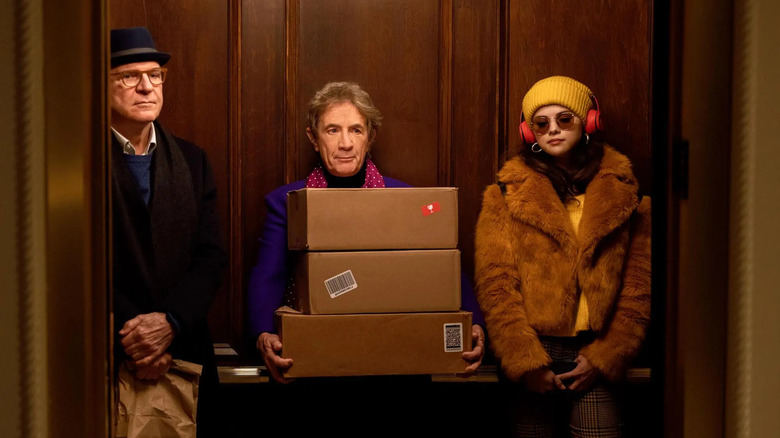 Only murders in the building, Charles, Oliver and Maple are in the elevator together, before they became friends. Oliver contract boxes