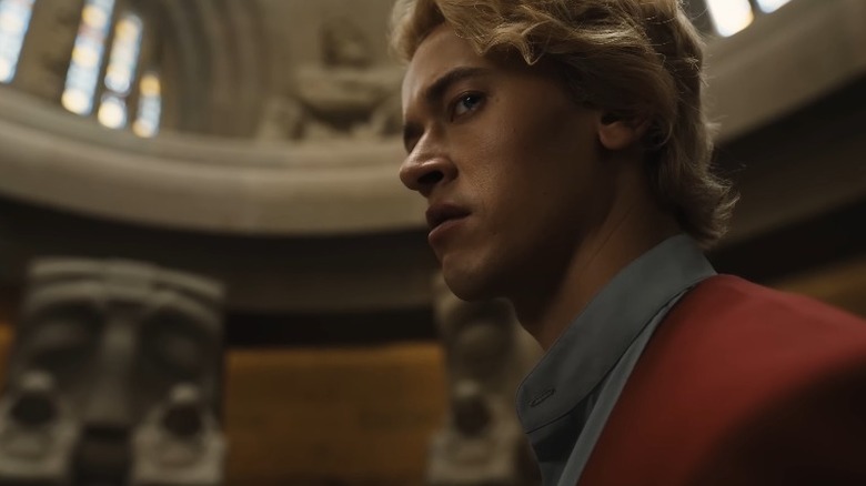 Coriolanus Snow looks to his side