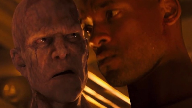Neville and a Darkseeker regard each other suspiciously