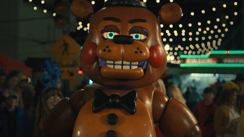 Toy Freddy Fazbear at an outdoor carnival in Five Nights at Freddy's 2