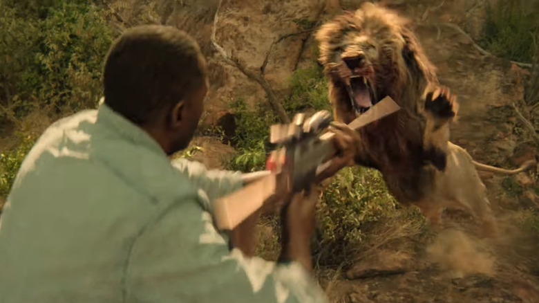 Nate Samuels is attacked by a lion in Beast